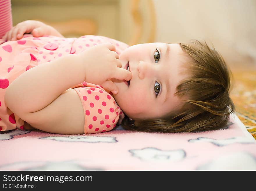 Girl with finger in mouth. Girl with finger in mouth