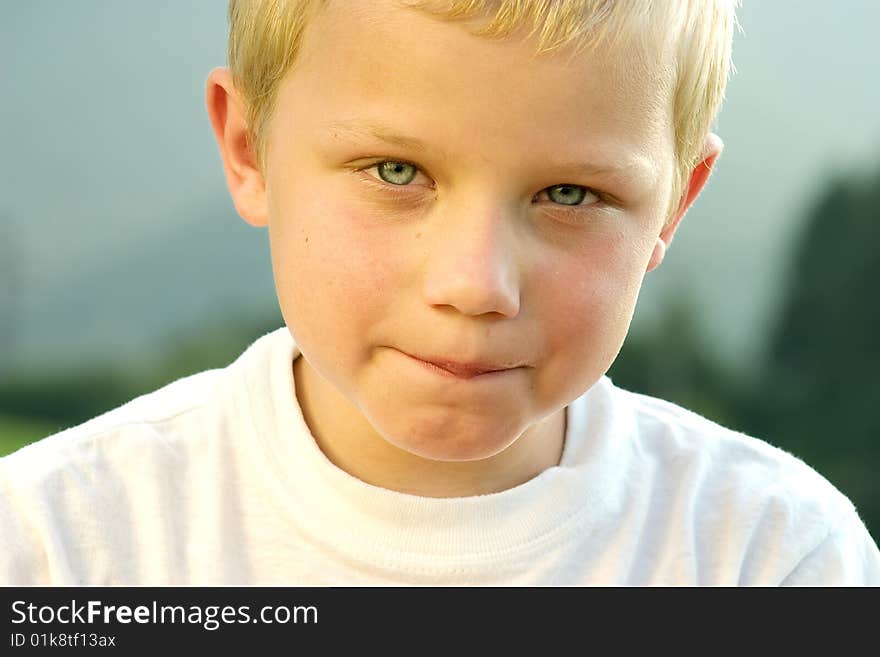 Portrait of little boy with blue eyes