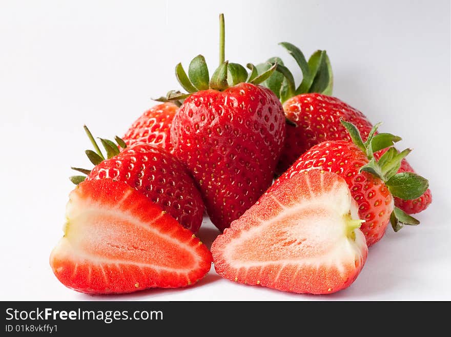 Ripe strawberries on a white background. Ripe strawberries on a white background