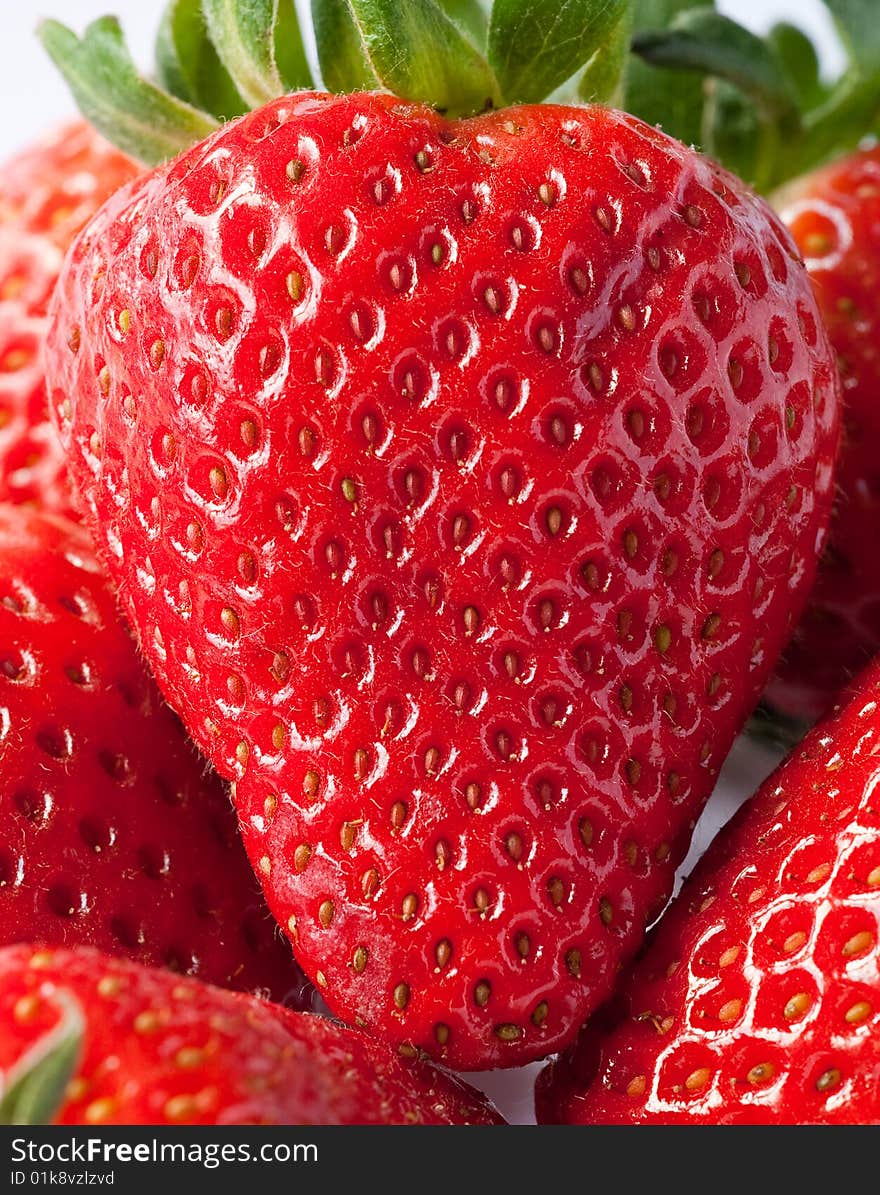 Ripe strawberries on a white background. Ripe strawberries on a white background