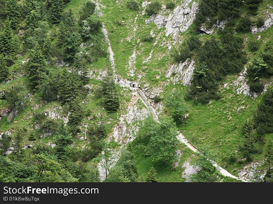 Group of people climbing a mountain near Zugspitze, Garmisch. Group of people climbing a mountain near Zugspitze, Garmisch