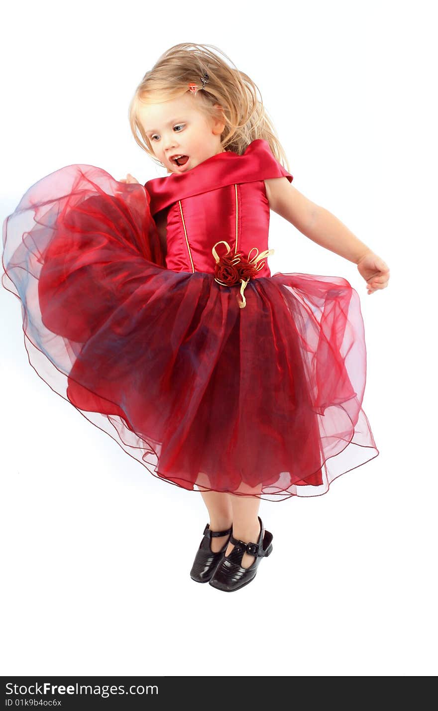 Portrait of the beautiful girl in a red dress. Portrait of the beautiful girl in a red dress