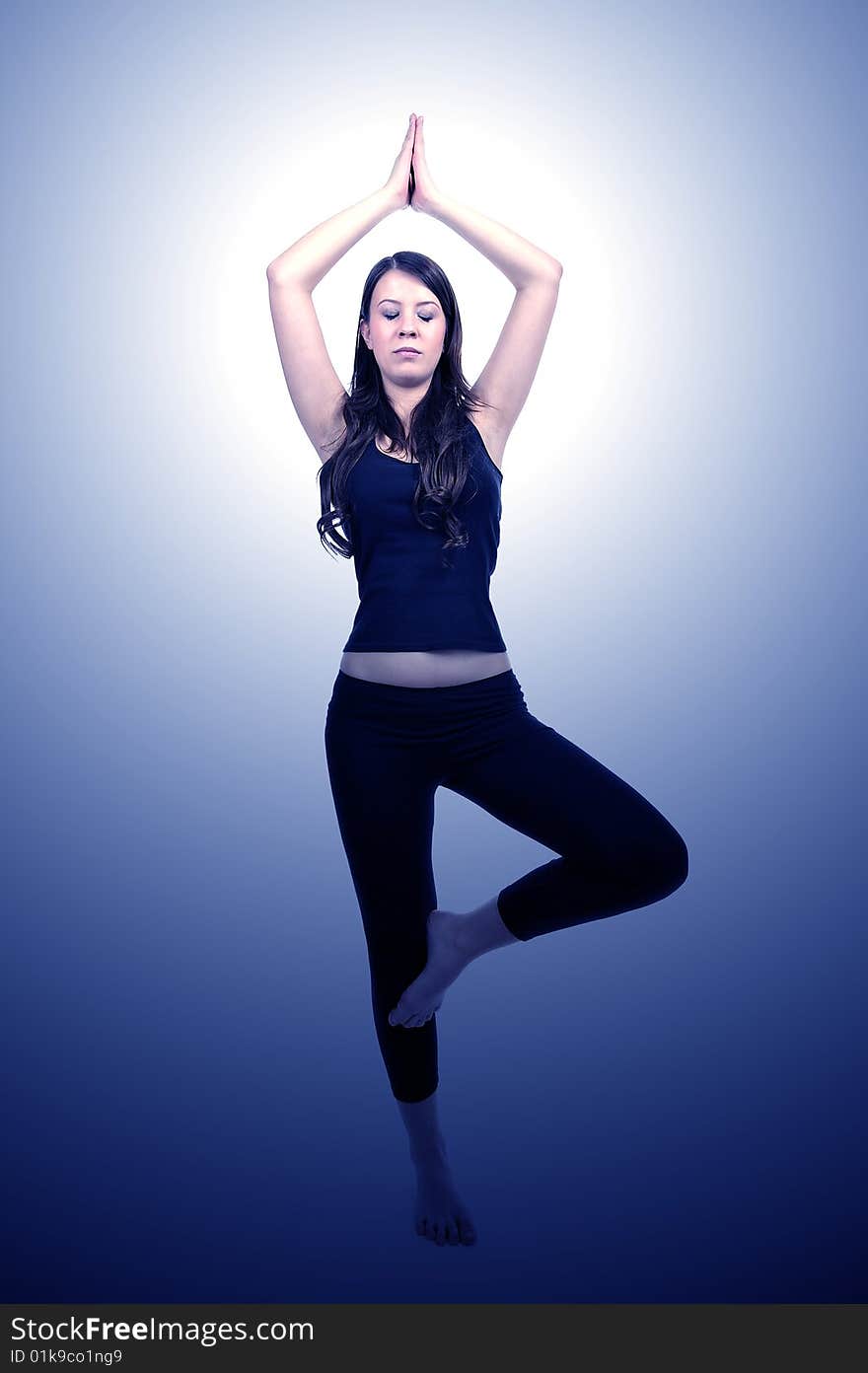 Young woman is doing an expert yoga exercise