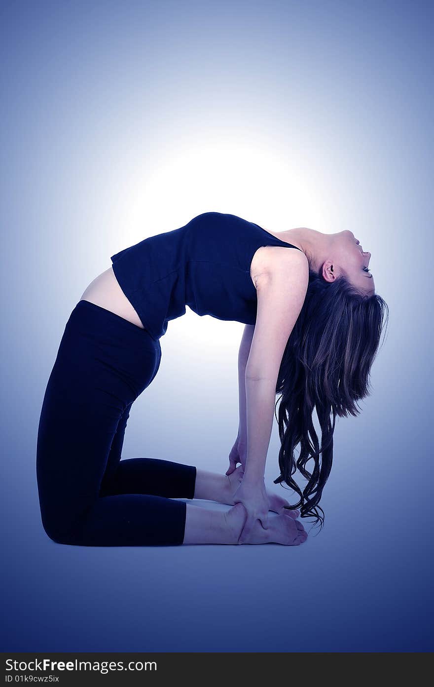 Woman is doing an expert yoga exercise