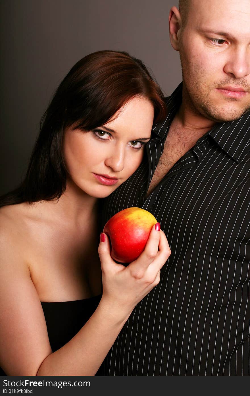 Temptation with a apple,studio shot