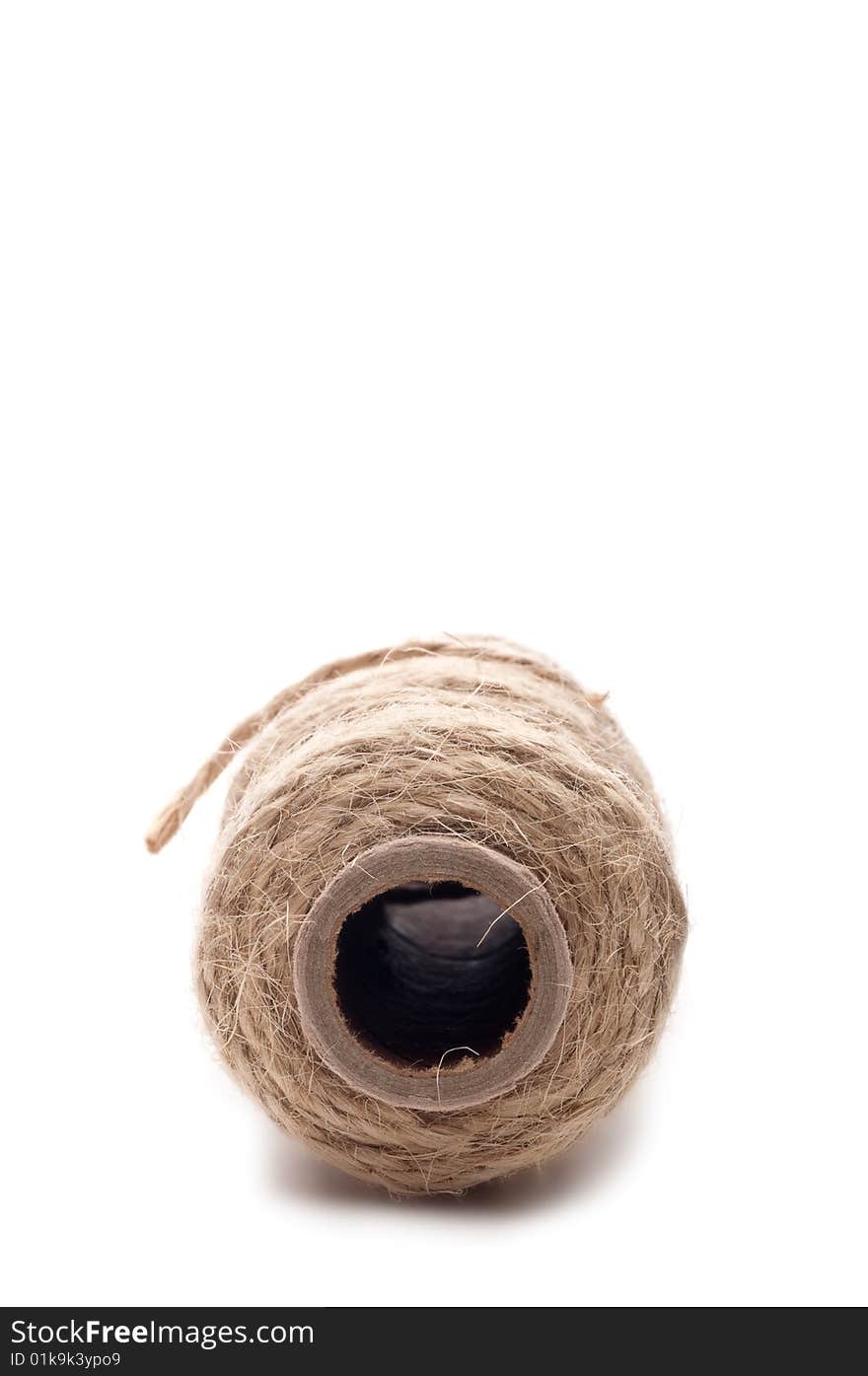 Close up of the end of a spool of twine