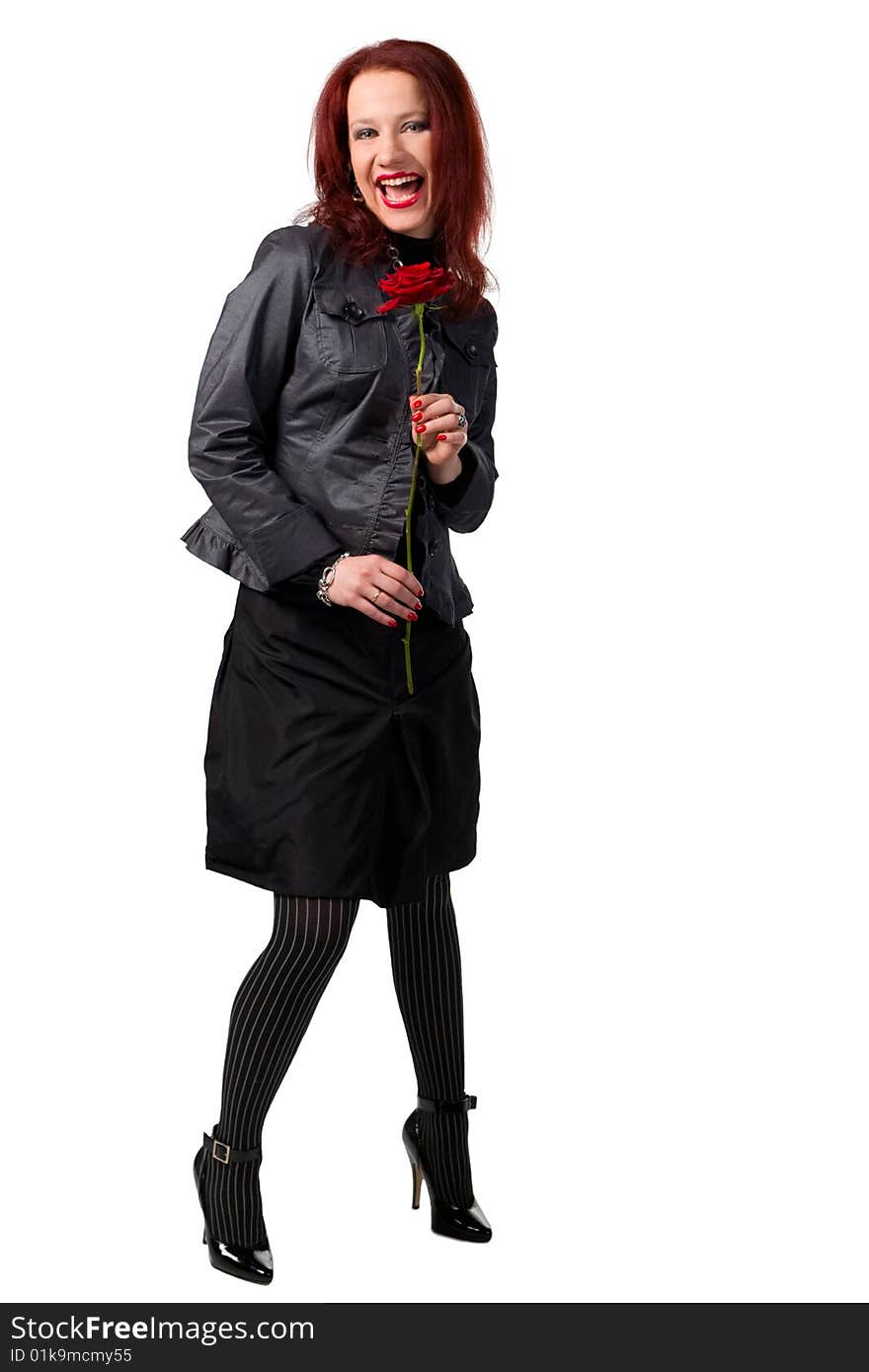 Interesting young woman with red rose in hand, smiling happily. Interesting young woman with red rose in hand, smiling happily.