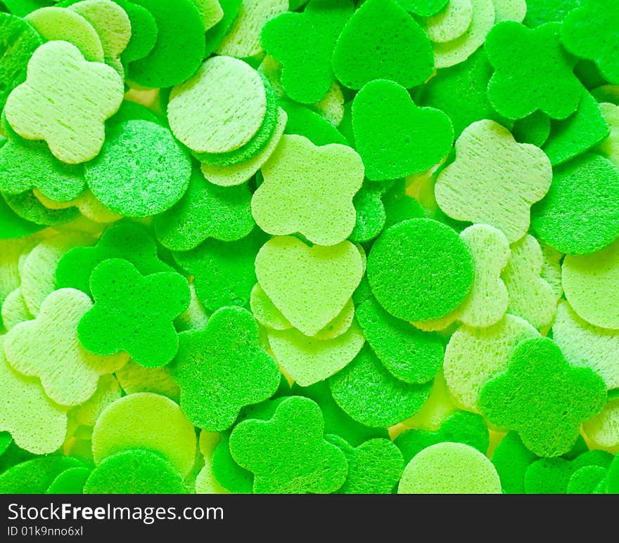 The background of green figurines. The background of green figurines