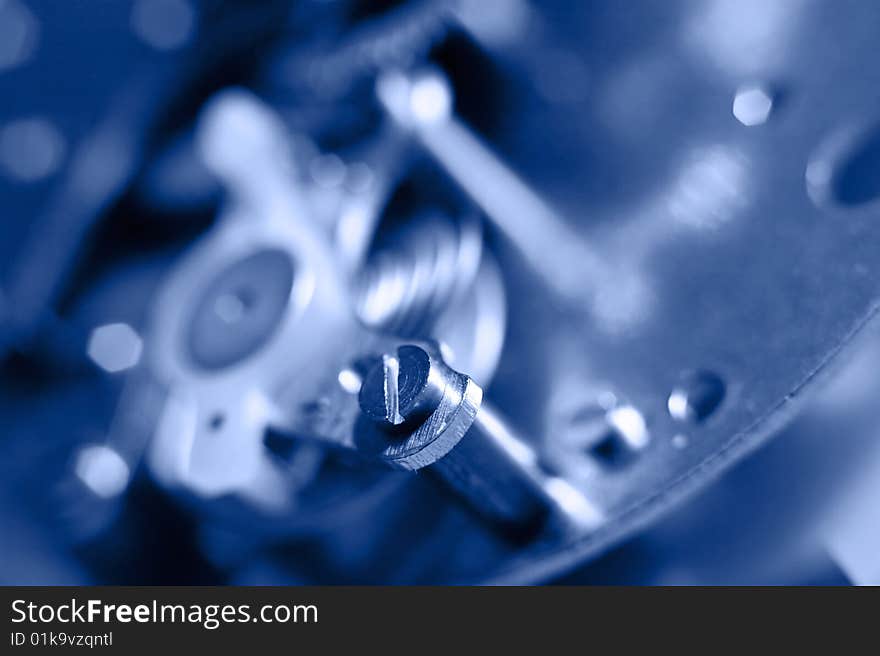 Cogs and wheels from the inside of an clock. Macro - low DOF.