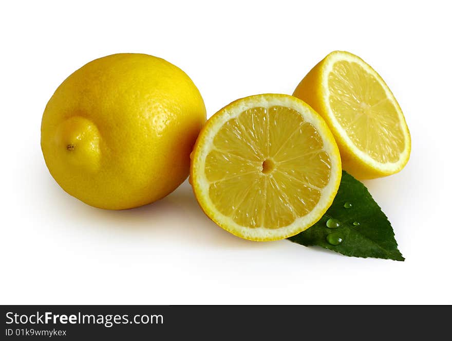 Lemons with a leaf on a white background