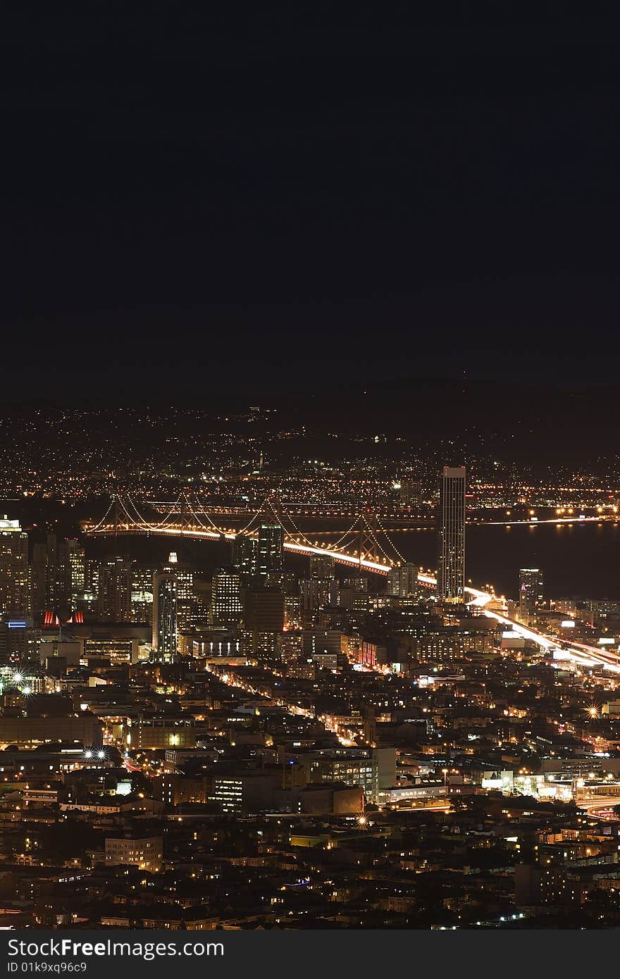 San Francisco at night with view of Baybridge.