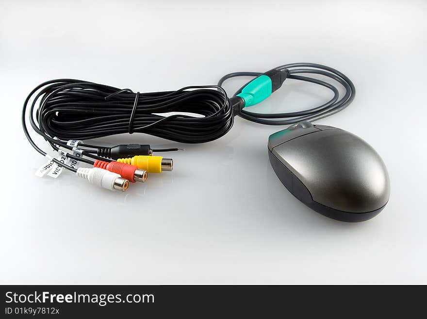 Mouse with the adapter on many wires. Mouse with the adapter on many wires