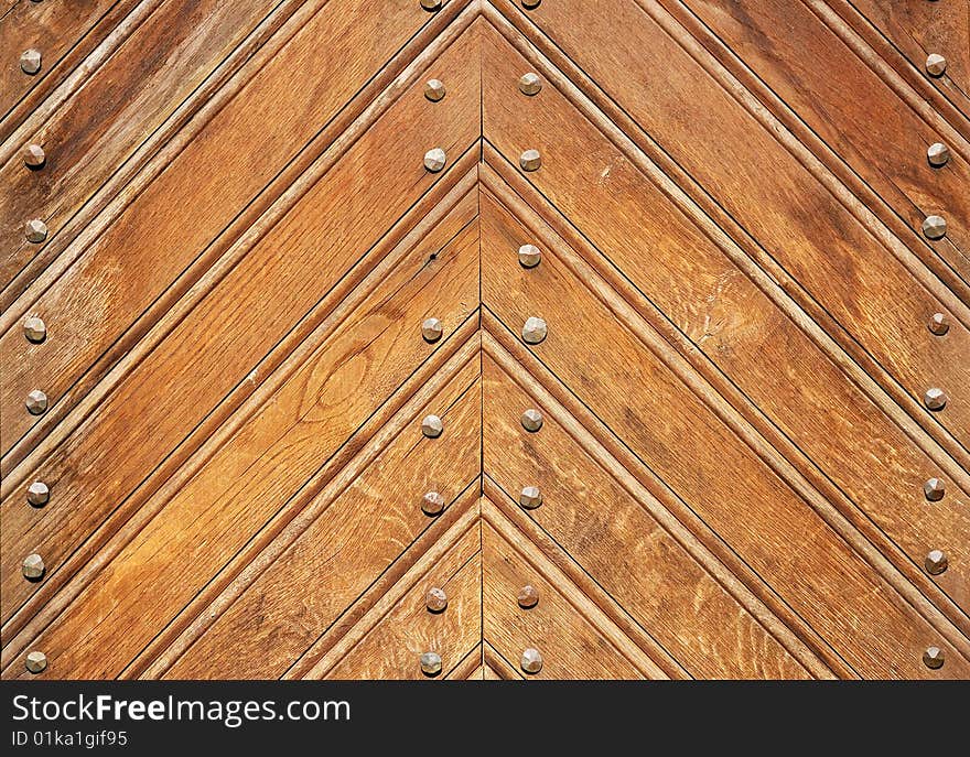 Fragment of durable wooden gate in old castle. Fragment of durable wooden gate in old castle