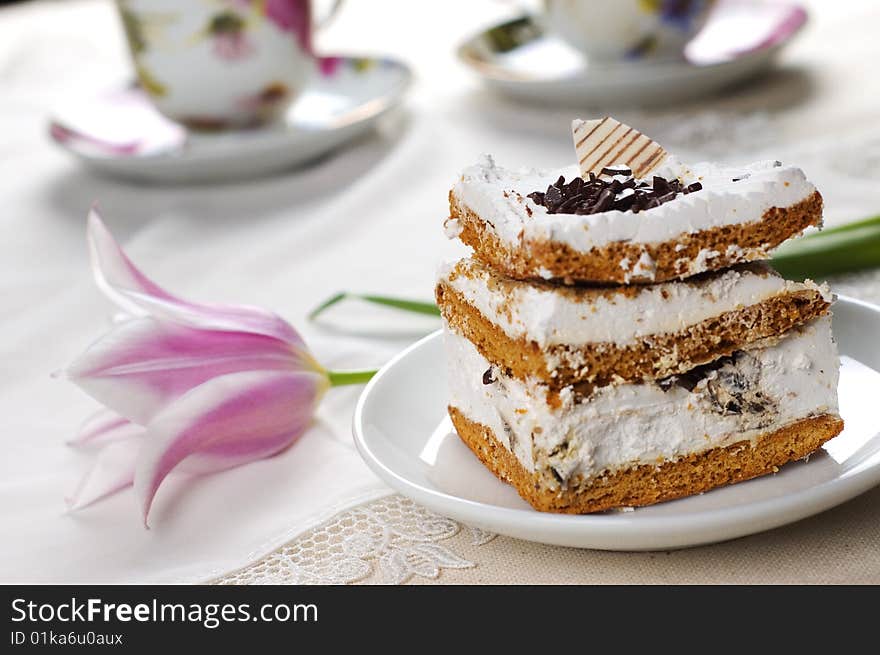 Cake and cups of tea