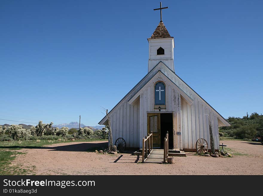 Old church standing in a southwestern town on a very clear day. Old church standing in a southwestern town on a very clear day