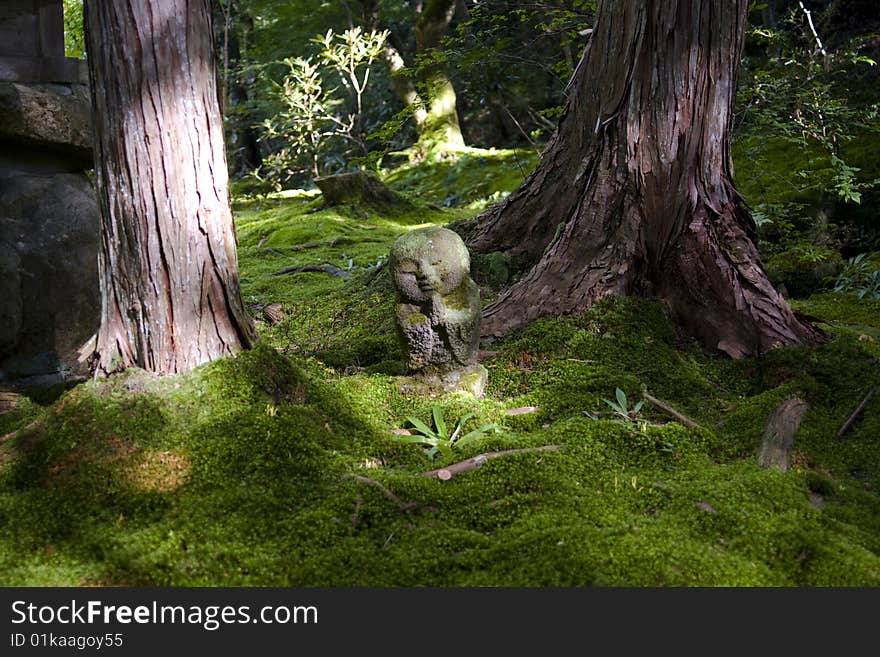 A stone statue of Jizo.