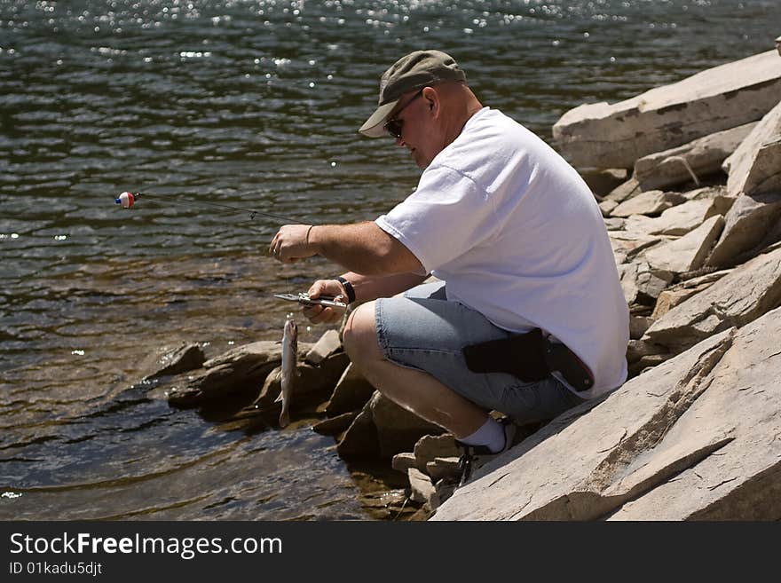 Man trout fishing in the Black Hills of South Dakota