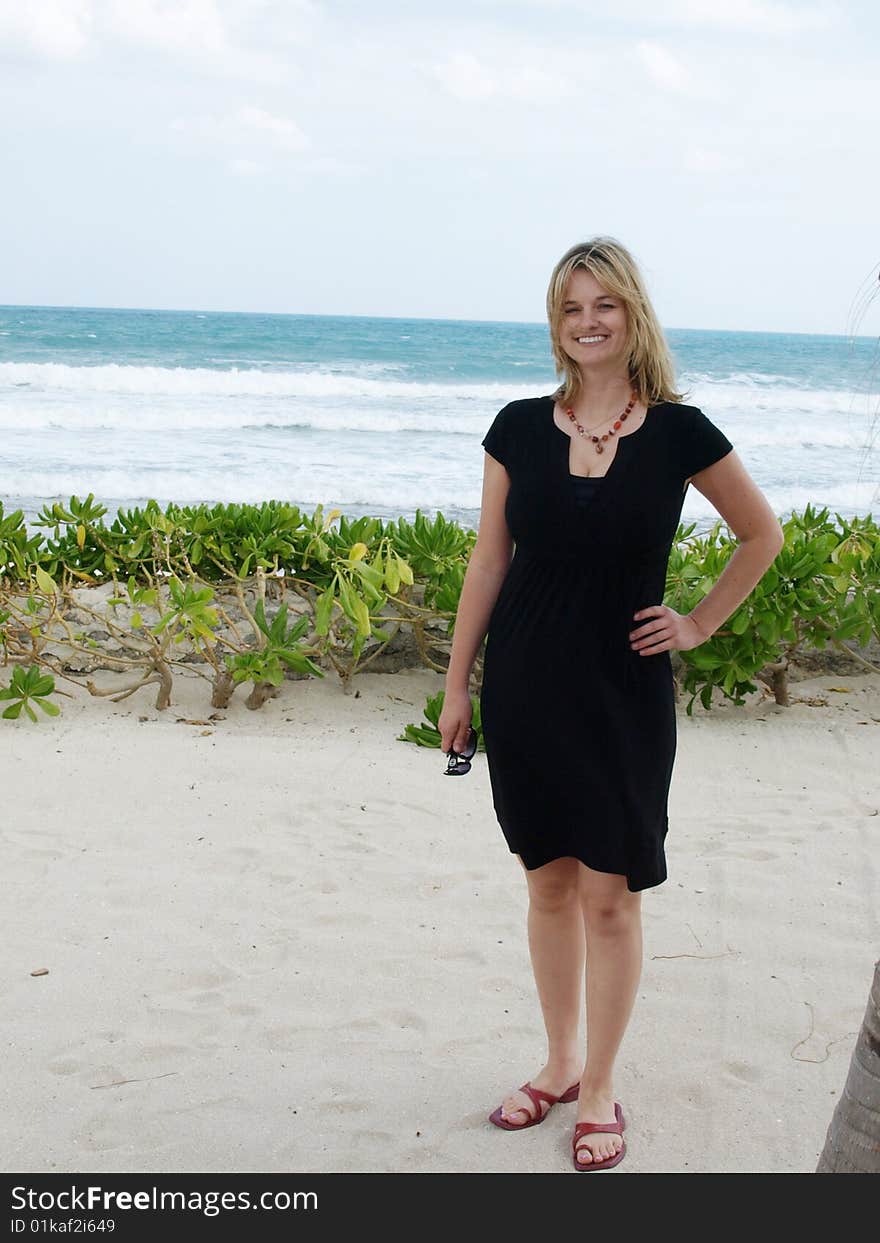 Well dressed beach girl.