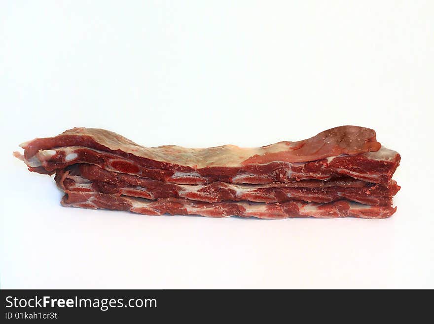 Raw beef on white background. Raw beef on white background