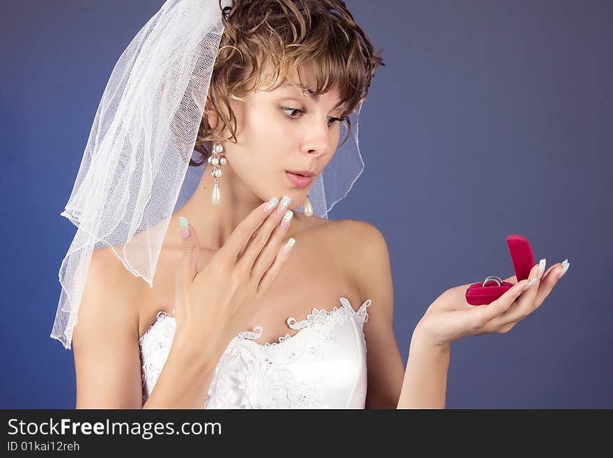 Young bride with wedding rings