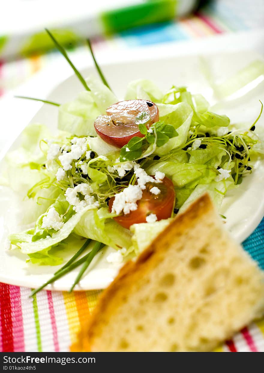 Fresh green salad with cottage cheese fruit and vegetables