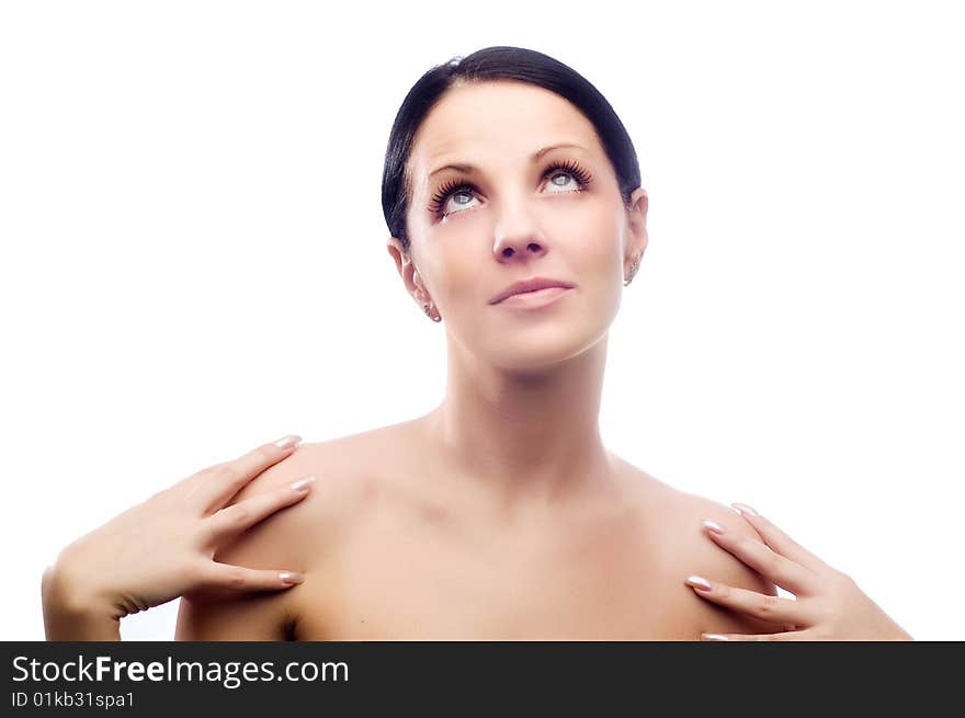 Closeup portrait of a happy young woman smiling isolated on white background