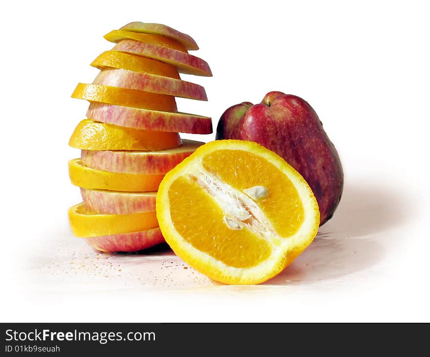 The fruit set of apples and oranges on a white background. The fruit set of apples and oranges on a white background