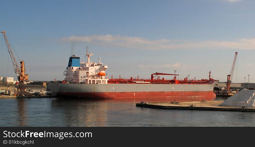 A ship in the harbour of ravenna waiting for the cargo. A ship in the harbour of ravenna waiting for the cargo