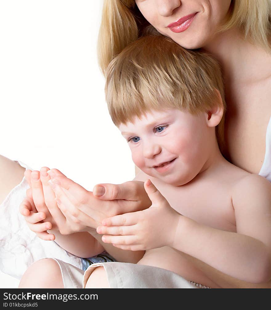 The little boy with mum on the isolated. The little boy with mum on the isolated