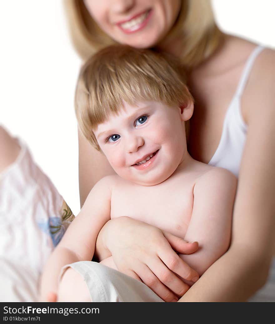 The little boy with mum on the isolated. The little boy with mum on the isolated