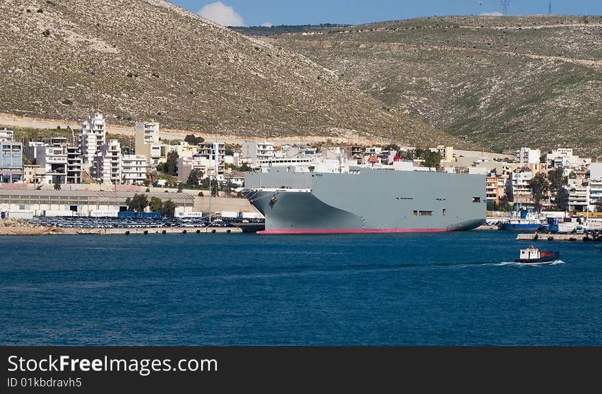 A ship in the harbour of pireaus waiting for the cargo. A ship in the harbour of pireaus waiting for the cargo