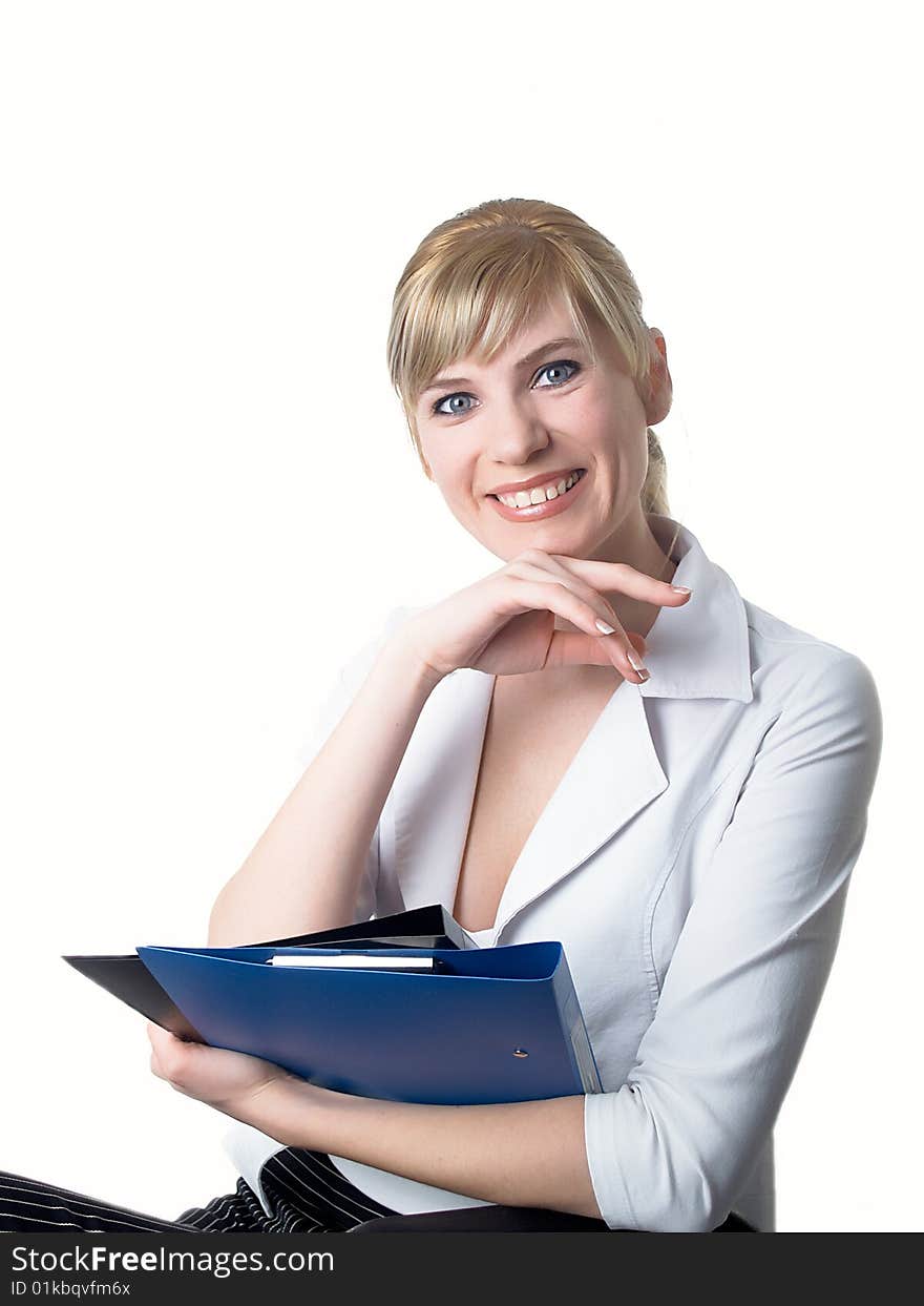 The girl in a white jacket with folders in hands. The girl in a white jacket with folders in hands