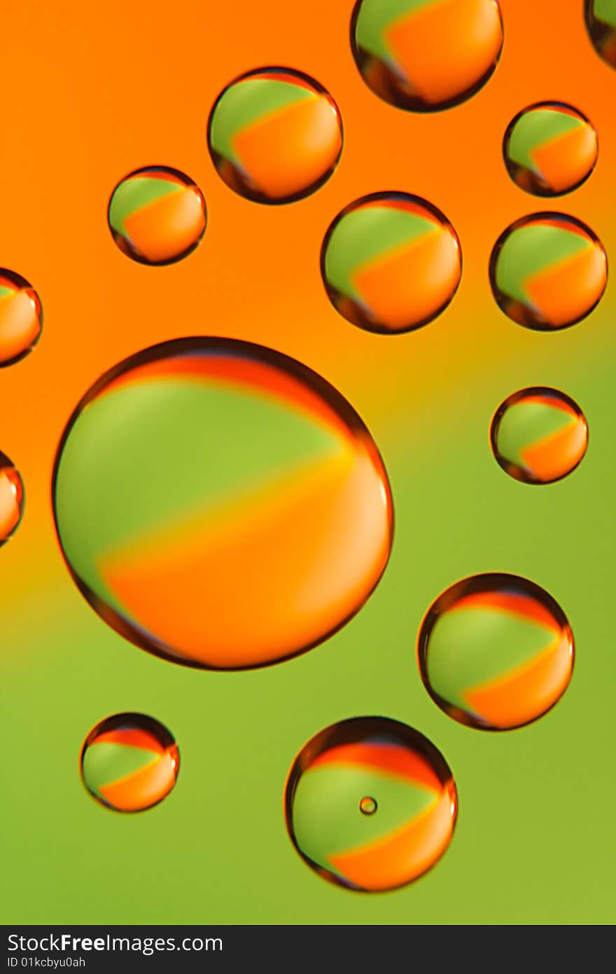 Flying drops on a two color background