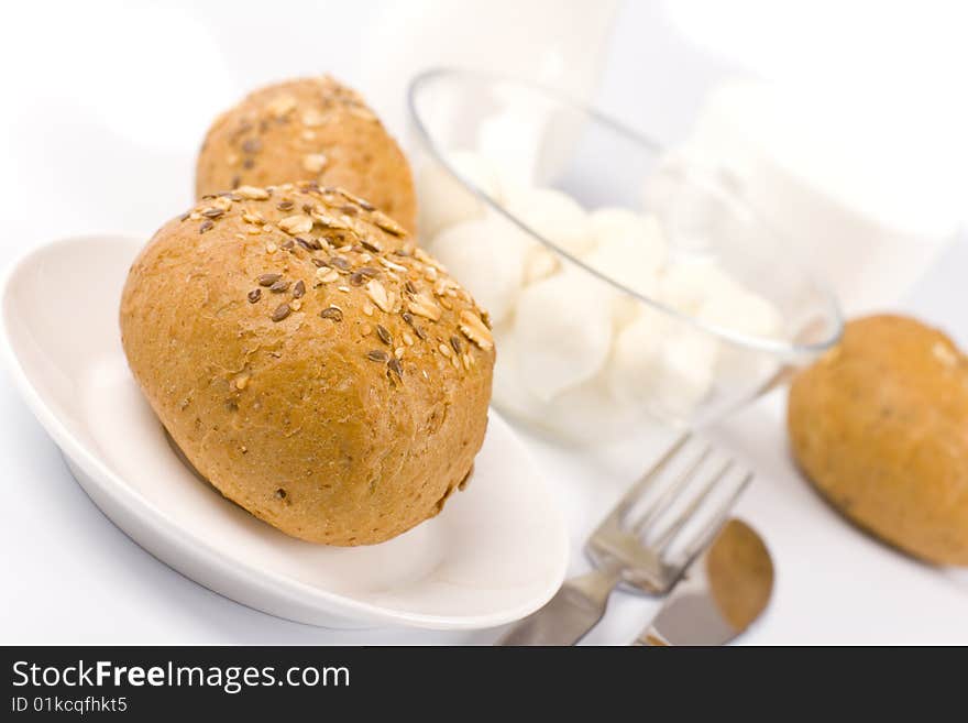 Bread and mozzarella closeup on white