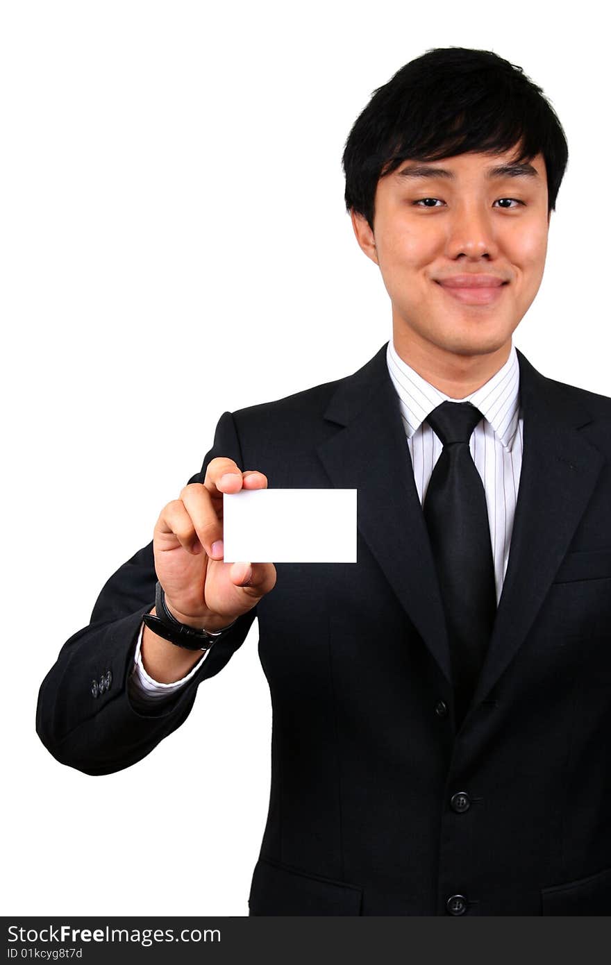 Young Asian Business man holding a name card. (Focus is on the card)