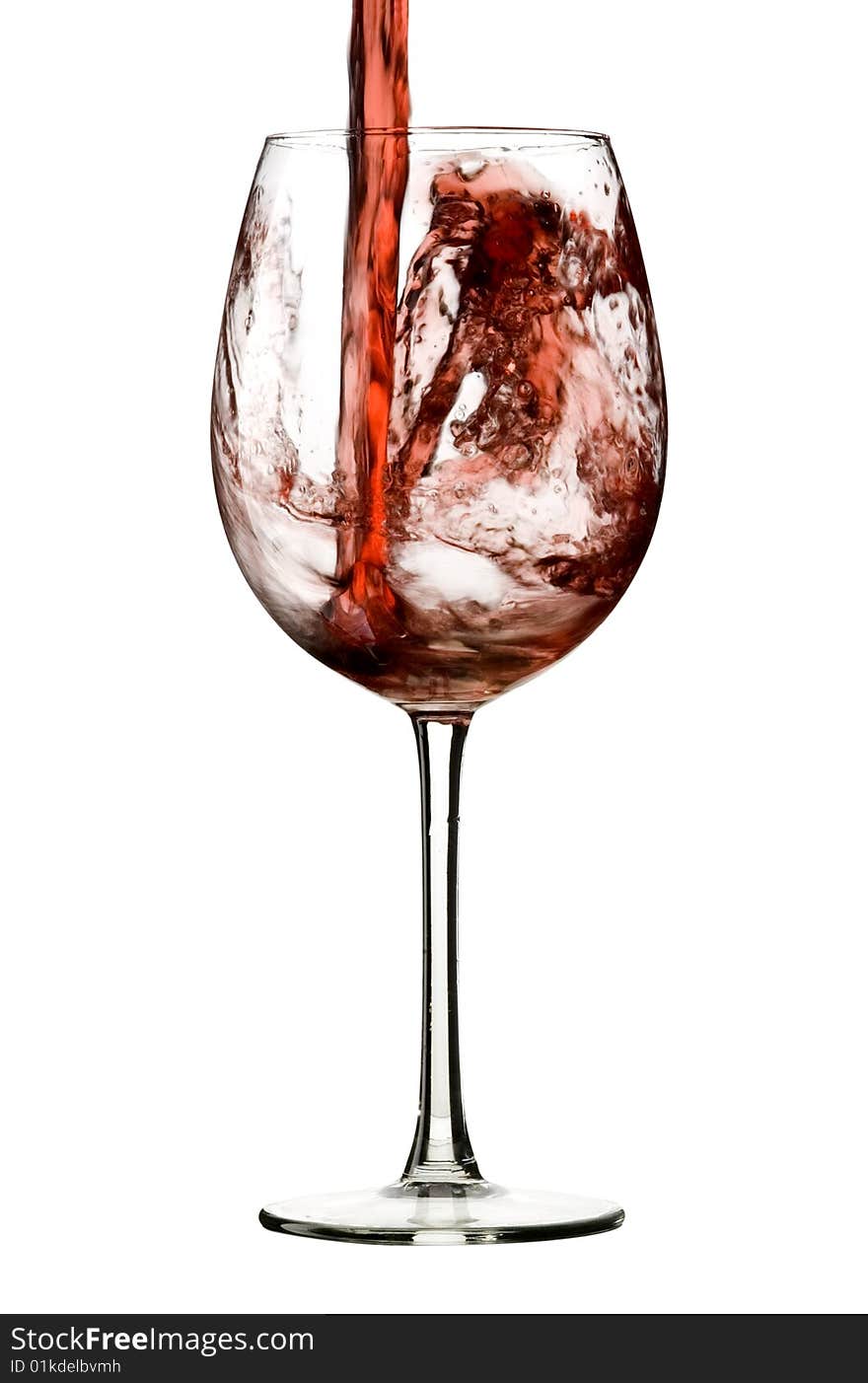 Pouring red wine to glass with white background