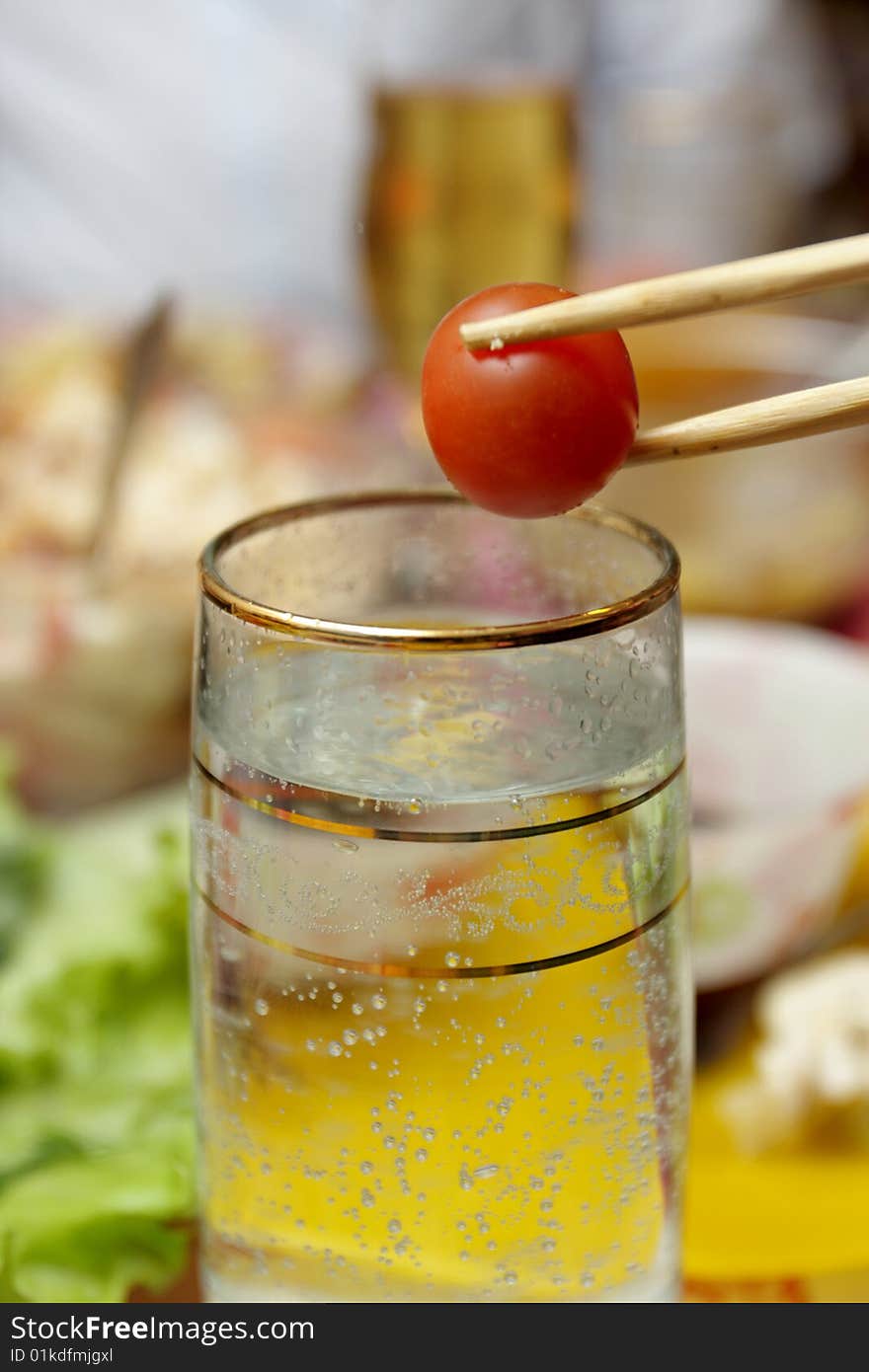 Cherry tomato over water