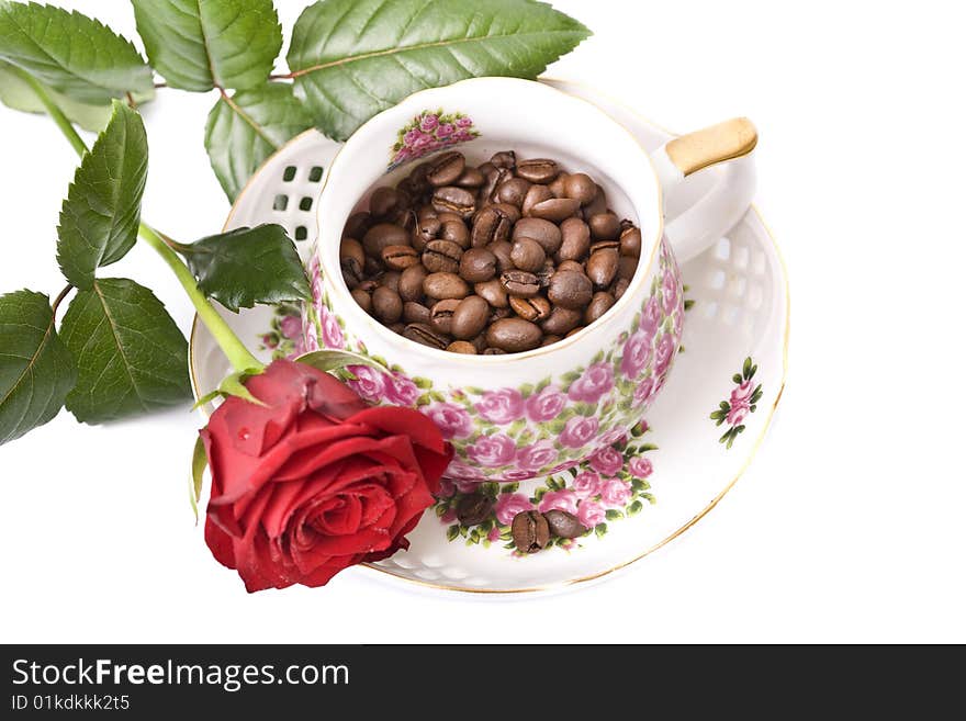 Coffee cup and grain on white background. Coffee cup and grain on white background