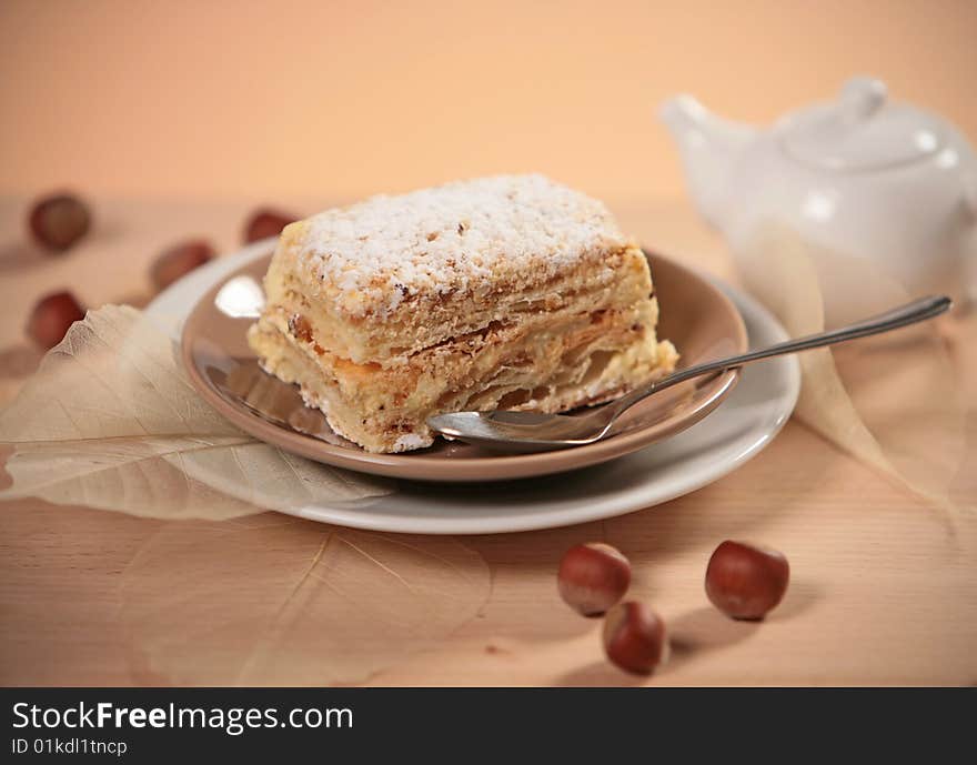 Tea cake with powdered sugar on plate