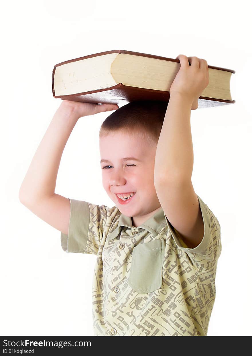 The child with book on the white