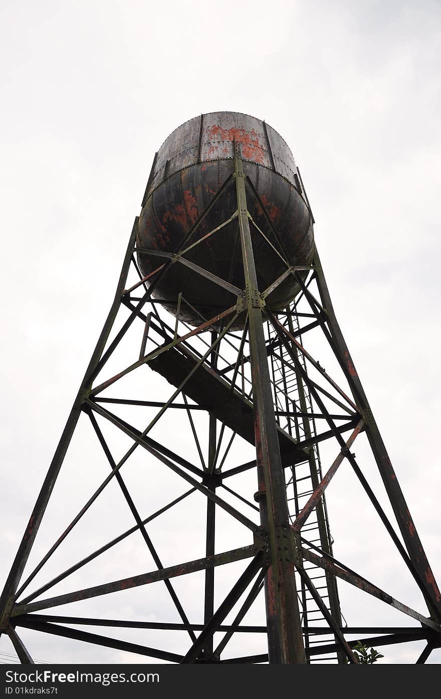 Water tank of the steam locomotive. Photos of a train station. Water tank of the steam locomotive. Photos of a train station.