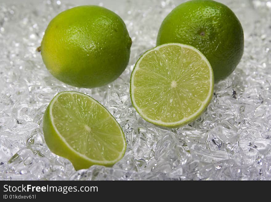 Cold fresh green limette on ice. Cold fresh green limette on ice