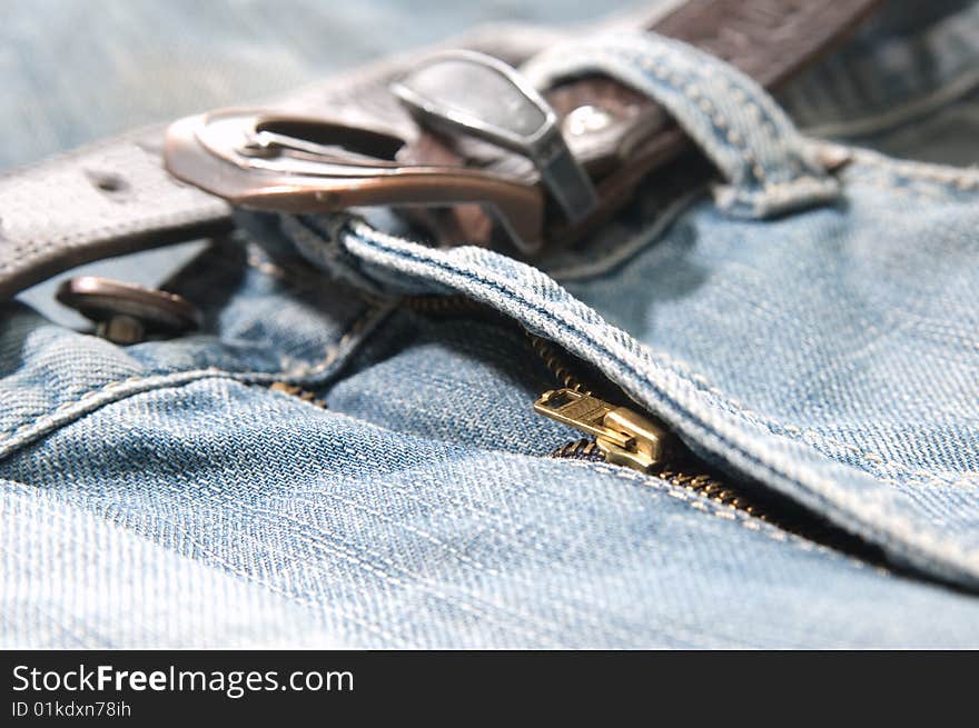 Blue jeans with leather belt