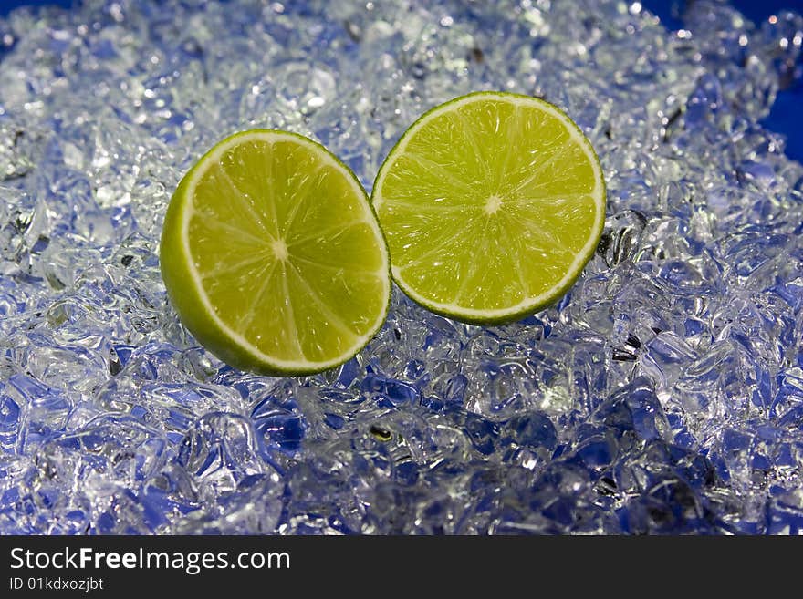 Cold fresh green limette on ice. Cold fresh green limette on ice