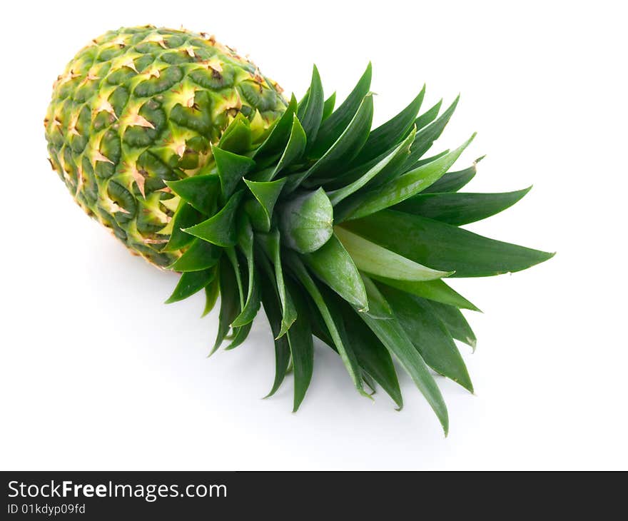 Ripe pineapple isolated on white.