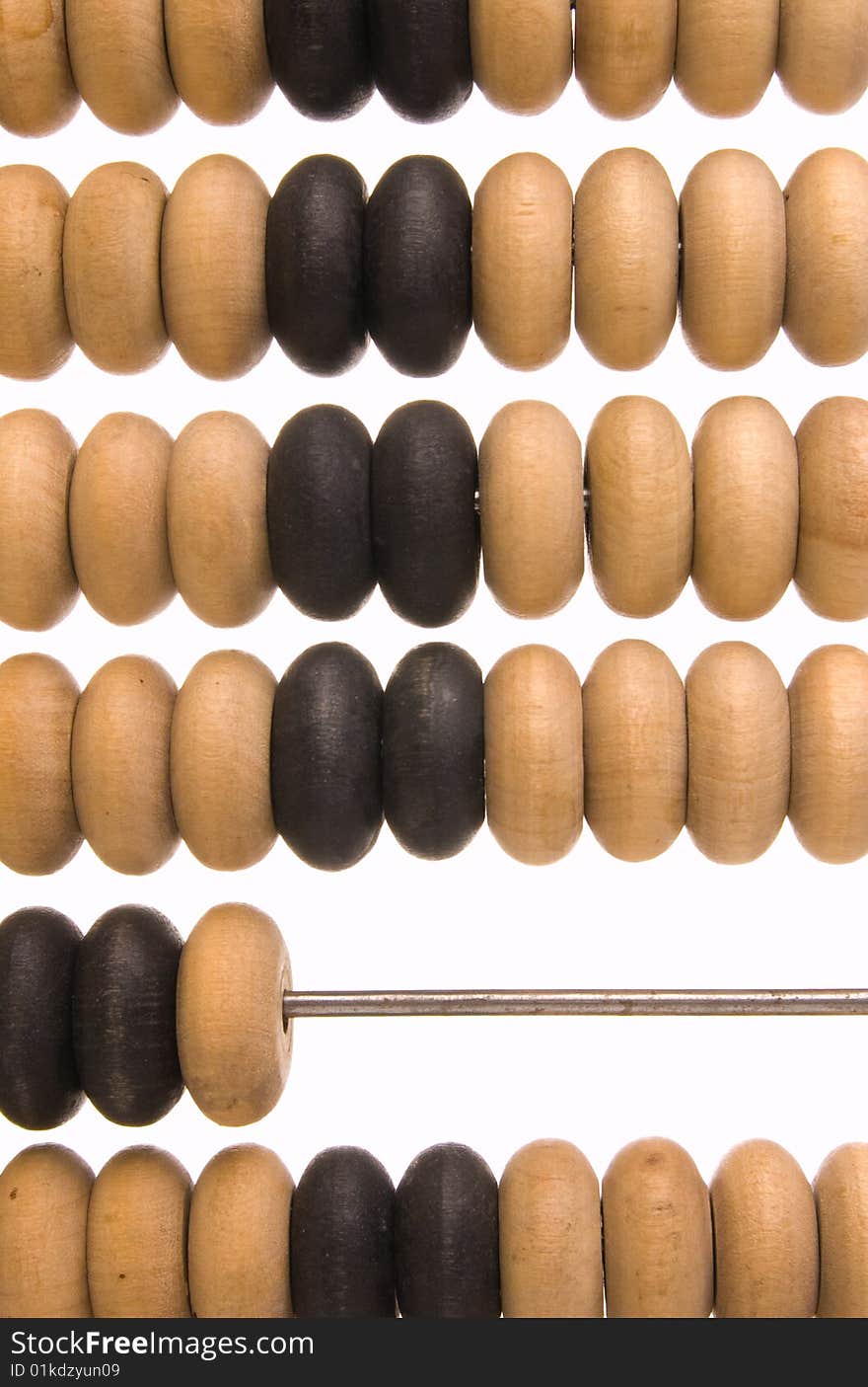 Obsolete wooden abacus, white background