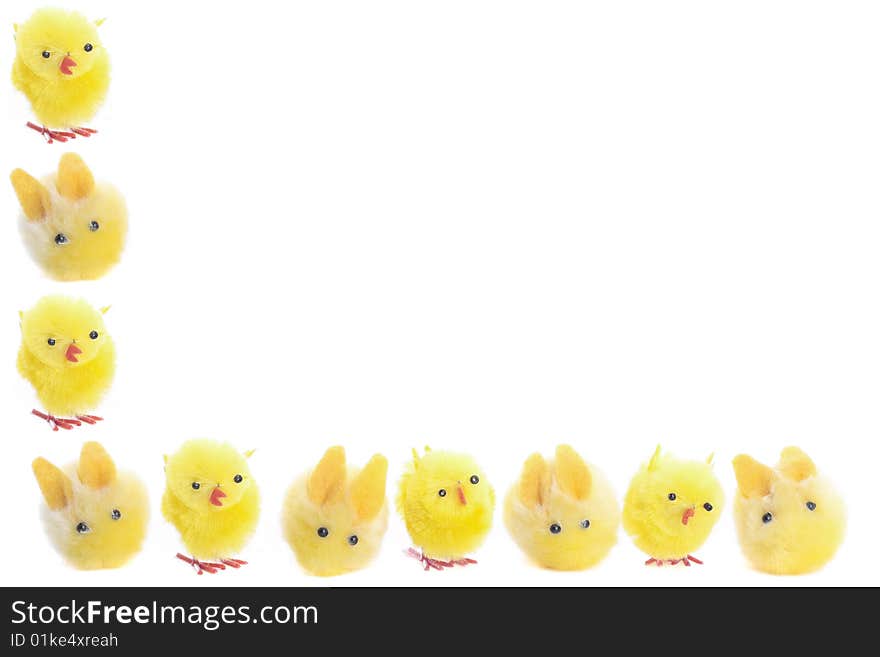 Easter chicks and bunny closeup over white background. Easter chicks and bunny closeup over white background