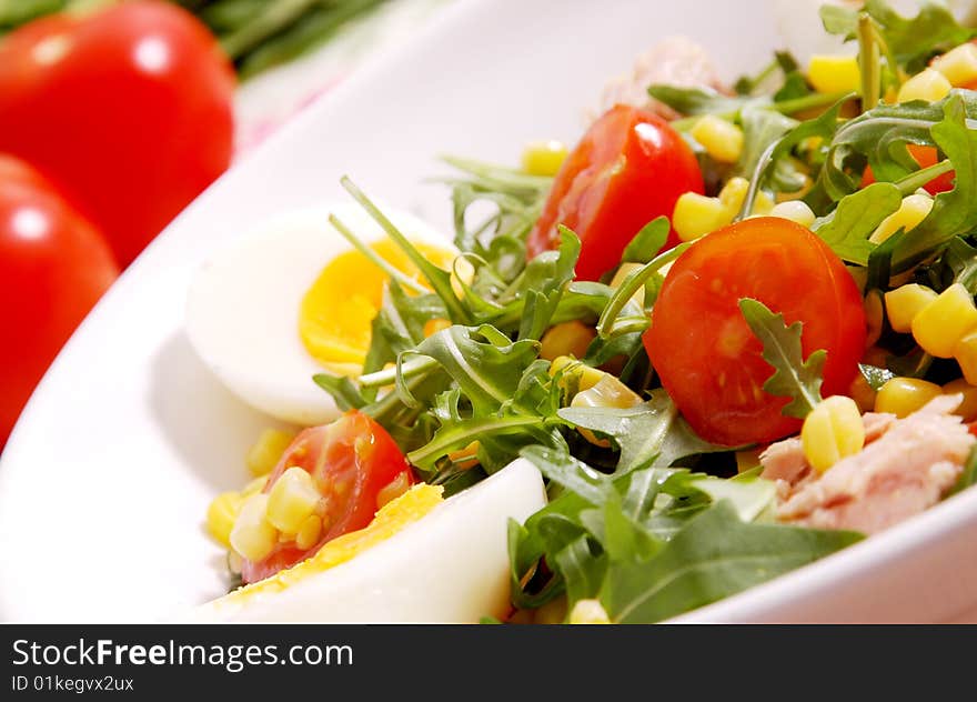 Eggs tomatoes rocket and tuna salad. Eggs tomatoes rocket and tuna salad