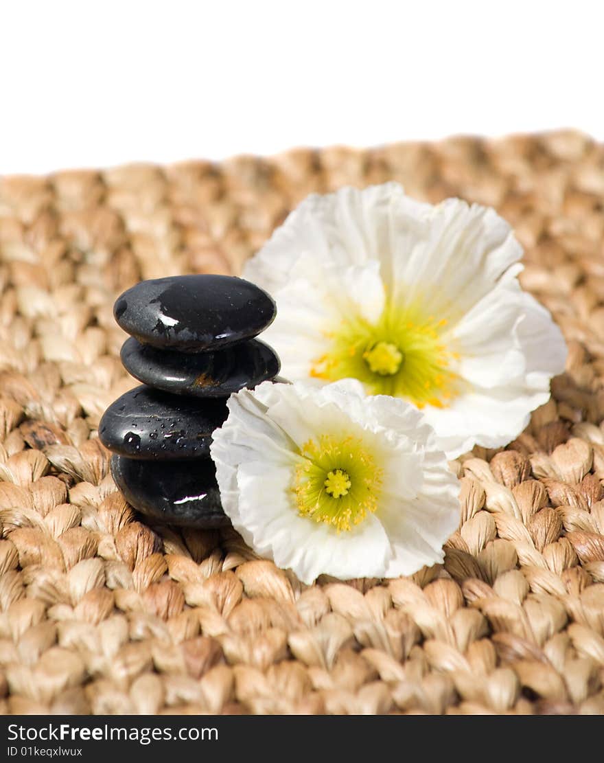 Zen stones with white flowers