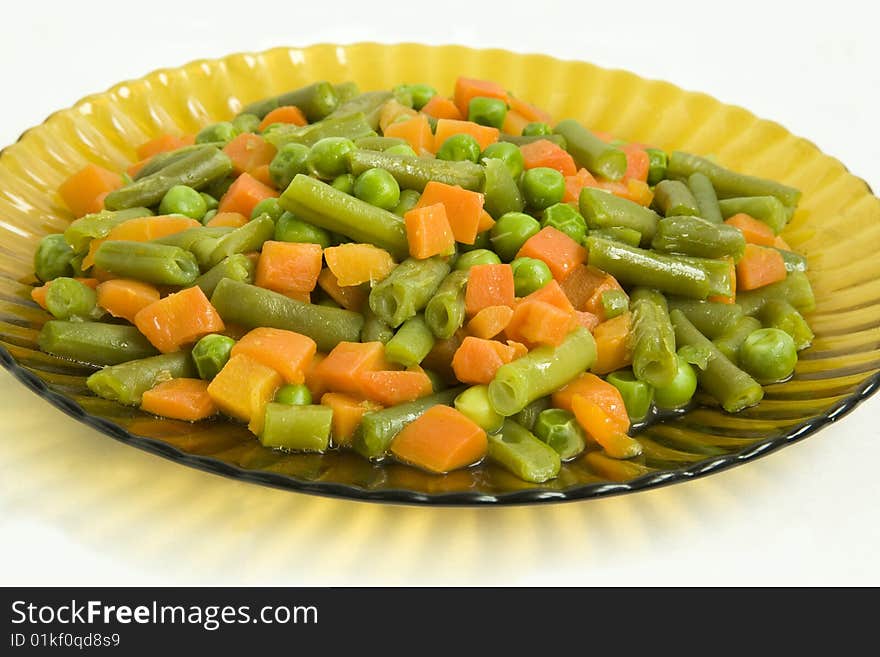 The prepared vegetables on a wavy glass plate